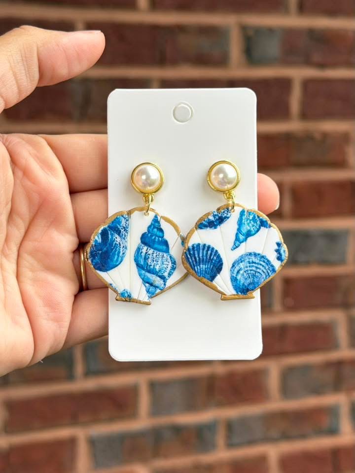 Seashell clay dangling earrings with blue design|7893