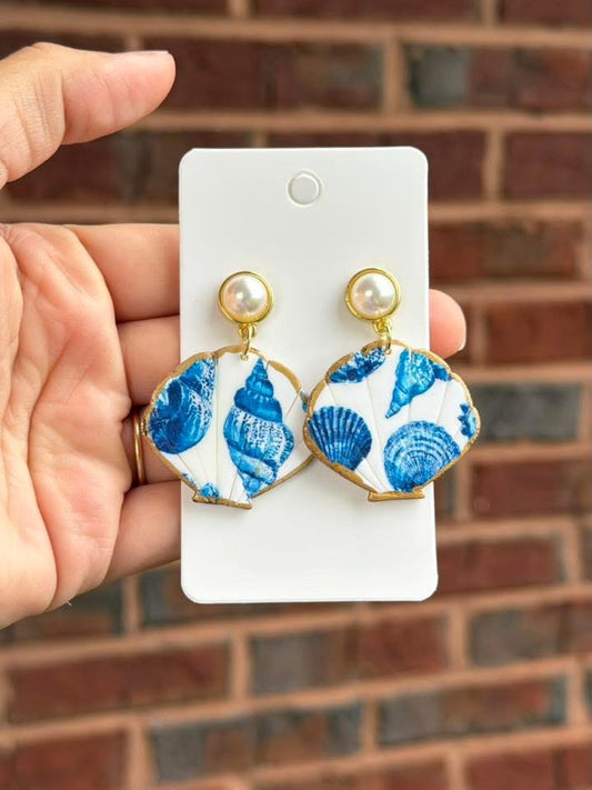 Seashell clay dangling earrings with blue design|7893
